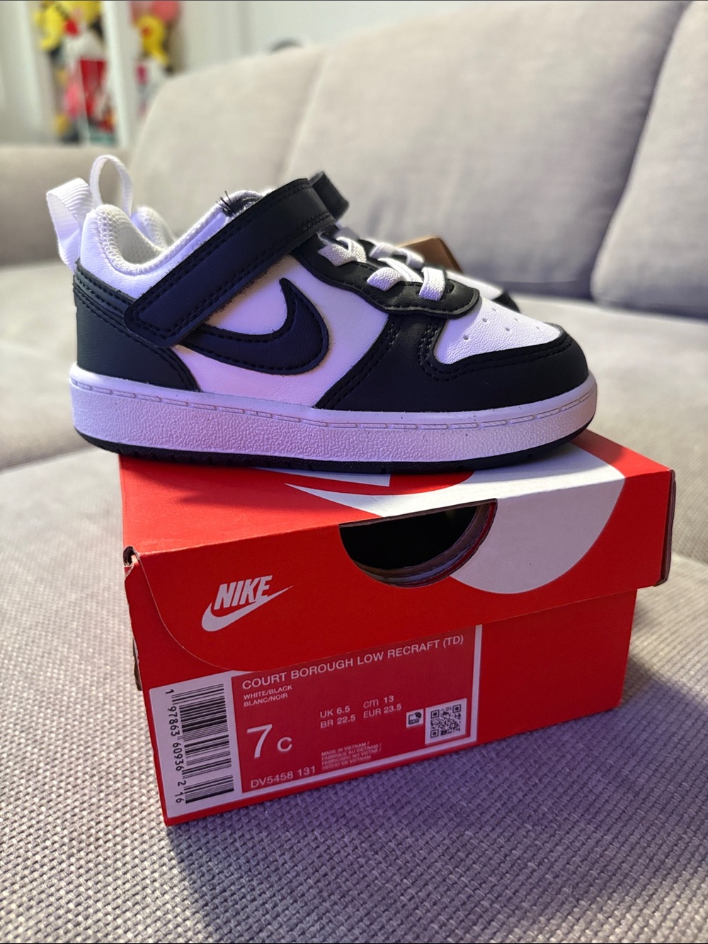 Nike Kids Black and White Low-Top Sneaker with Hook-and-Loop Strap